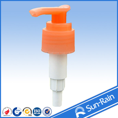 Orange plastic lotion pump for shampoo bottle